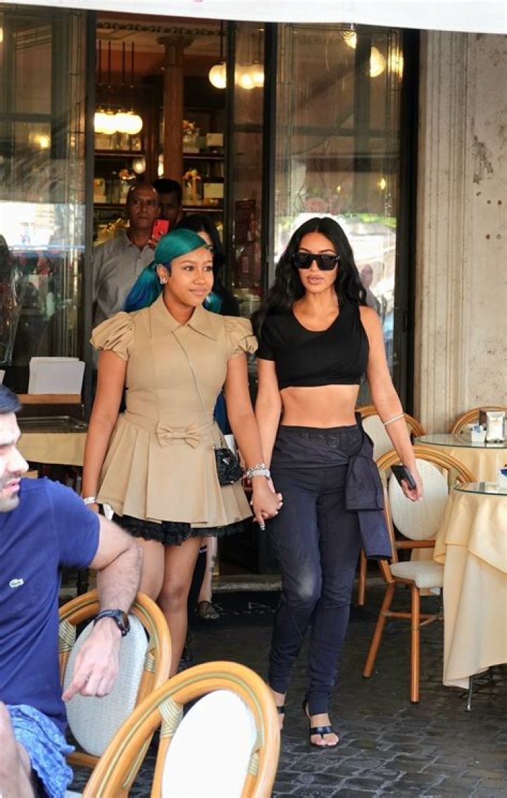 Rome, ITALY - *EXCLUSIVE* - Kim&rsquo;s Roman Holiday! Kim Kardashian jets off to Rome and is pictured enjoying some of the local attractions. The reality star was seen in blue shorts and wedge flip flops with her eyebrows in tact after recently sporting bleached brows for a SKIMs ad. Kim visited the Colosseum and headed off to lunch with a group of pals. Kim is believed to be in the city for work commitments but took some time off to explore the ancient amphitheatre. Pictured: Kim Kardashian BACKGRID USA 28 JUNE 2021 BYLINE MUST READ: Cobra Team / BACKGRID USA: +1 310 798 9111 / UK: +44 208 344 2007 / *UK Clients - Pictures Containing Children Please Pixelate Face Prior To Publication*