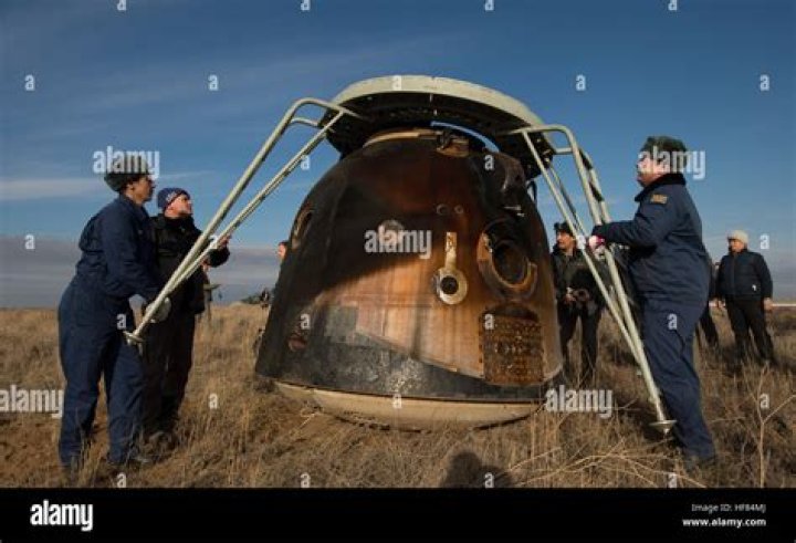Russian search and rescue team members help NASA astronaut Christina Koch to leave the Russian Soyuz MS-13 space capsule after landing in a remote area southeast of Zhezkazgan in the Karaganda region of Kazakhstan, 06 February 2020. A Soyuz space capsule with NASA US astronaut Christina Koch, ESA astronaut Luca Parmitano and Russian cosmonaut Alexander Skvortsov of Roscosmos, returning from a mission to the International Space Station, landed safely in the steppes of Kazakhstan. Soyuz MS-13 space capsule lands with Expedition 61 in Kazakhstan, Dzhezkazgan - 06 Feb 2020