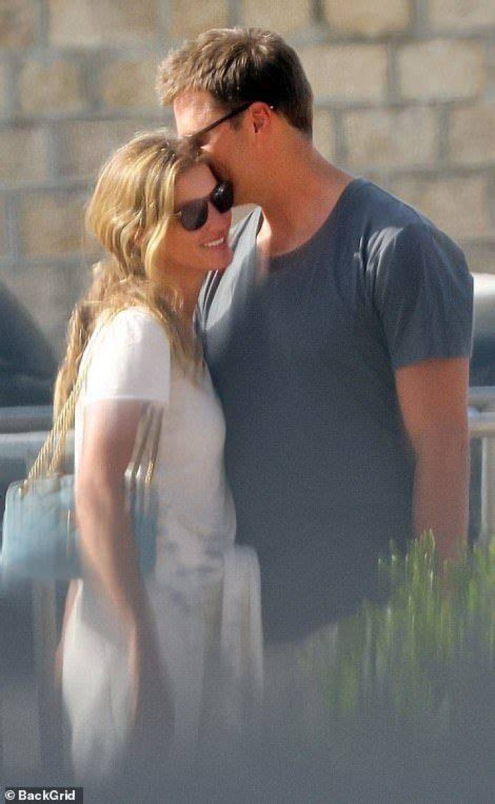 Saint-Tropez, FRANCE - *EXCLUSIVE* - Tom Brady cuddles up to his wife, Gisele Bunchchen, as the couple enjoys a romantic getaway to Saint Tropez. The Brazilian model smiled as Tom leaned in and whispered in her ear as the couple was spotted briefly over the weekend during a casual outing. The pair, who have been married for 13 years, has been enjoying some time together before Tom returns to the field again for his 23rd NFL season after initially announcing his retirement in February. The seven-time Super Bowl champion and five-time Super Bowl MVP announced roughly a month later that he'd changed his mind and would play another season with the Buccaneers. *PHOTOS SHOT ON 06/27/2022* Pictured: Gisele Bundchen, Tom Brady BACKGRID USA 29 JUNE 2022 BYLINE MUST READ: BACKGRID USA: +1 310 798 9111 / UK: +44 208 344 2007 / *UK Clients - Pictures Containing Children Please Pixelate Face Prior To Publication*