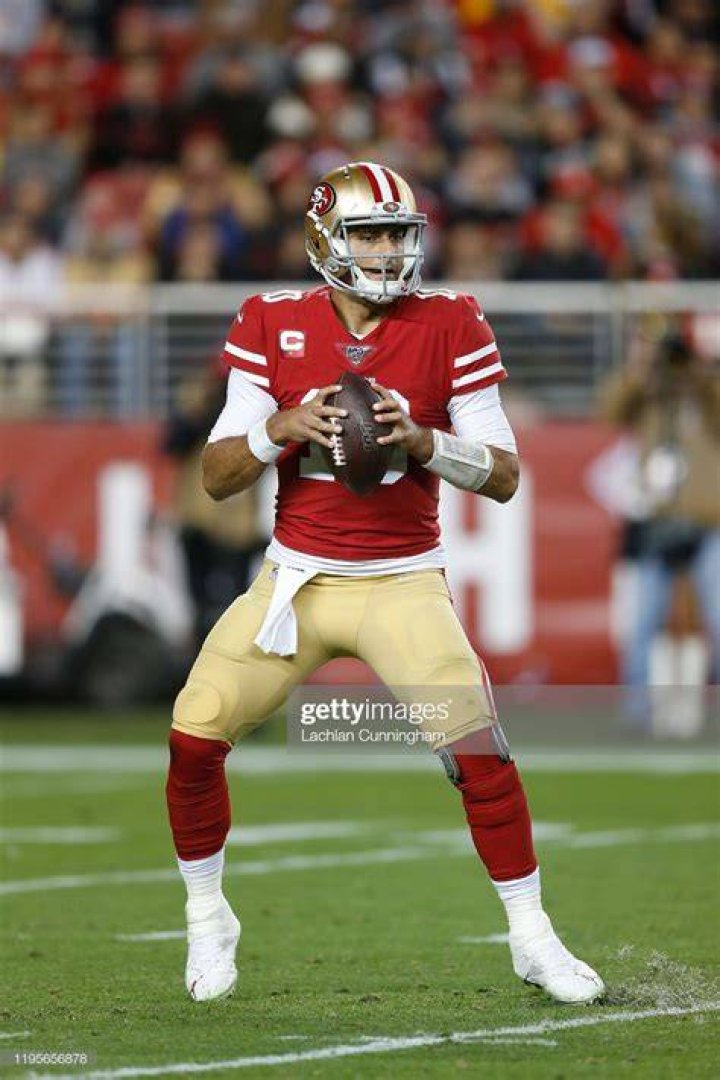 San Francisco 49ers quarterback Jimmy Garoppolo (10) pitches the ball during an NFL divisional playoff football game against the Green Bay Packers, Saturday, Jan 22. 2022, in Green Bay, Wis 49ers Packers Football, Green Bay, United States - 23 Jan 2022