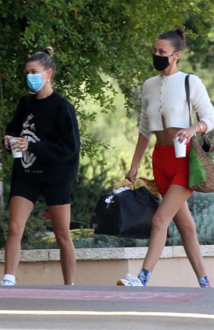Sardinia, ITALY - Hailey Baldwin and Bella Hadid throw on their bikinis and have some lunch while relaxing on a yacht in Sardinia. Hailey rocked a leopard print bikini while Bella sported a orange bikini. Pictured: Hailey Baldwin BACKGRID USA 23 JUNE 2020 BYLINE MUST READ: CIAOPIX / FREZZA LAFATA / BACKGRID USA: +1 310 798 9111 / UK: +44 208 344 2007 / *UK Clients - Pictures Containing Children Please Pixelate Face Prior To Publication*