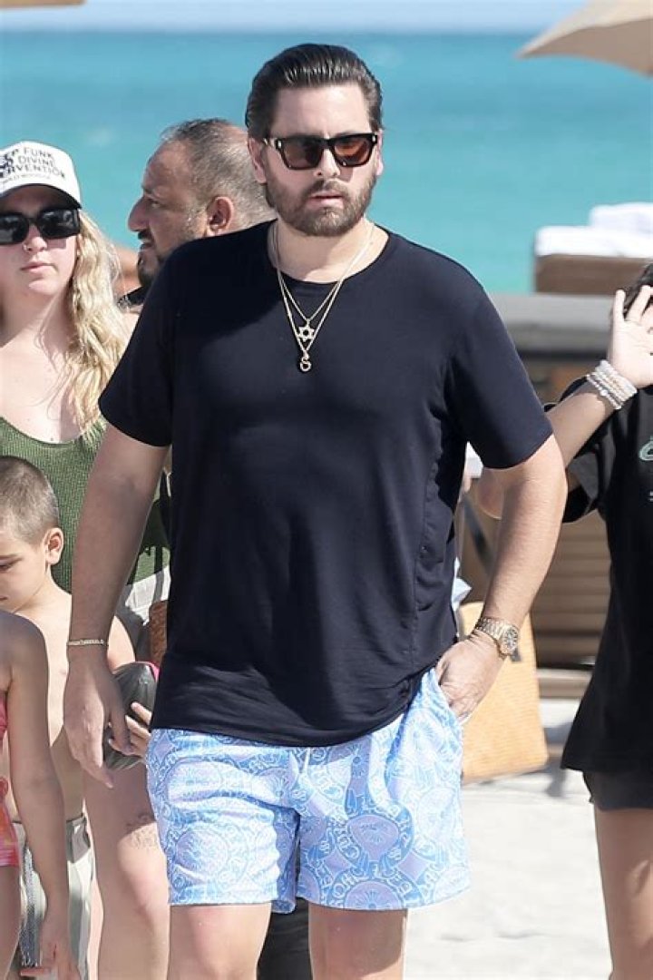 Scott Disick looks relaxed as he spends time with his 3 children on the beach in Miami. 22 Feb 2022 Pictured: Scott Disick, Mason Disick, Penelope Disick, Reign Disick. Photo credit: MEGA TheMegaAgency.com +1 888 505 6342 (Mega Agency TagID: MEGA830586_002.jpg) [Photo via Mega Agency]