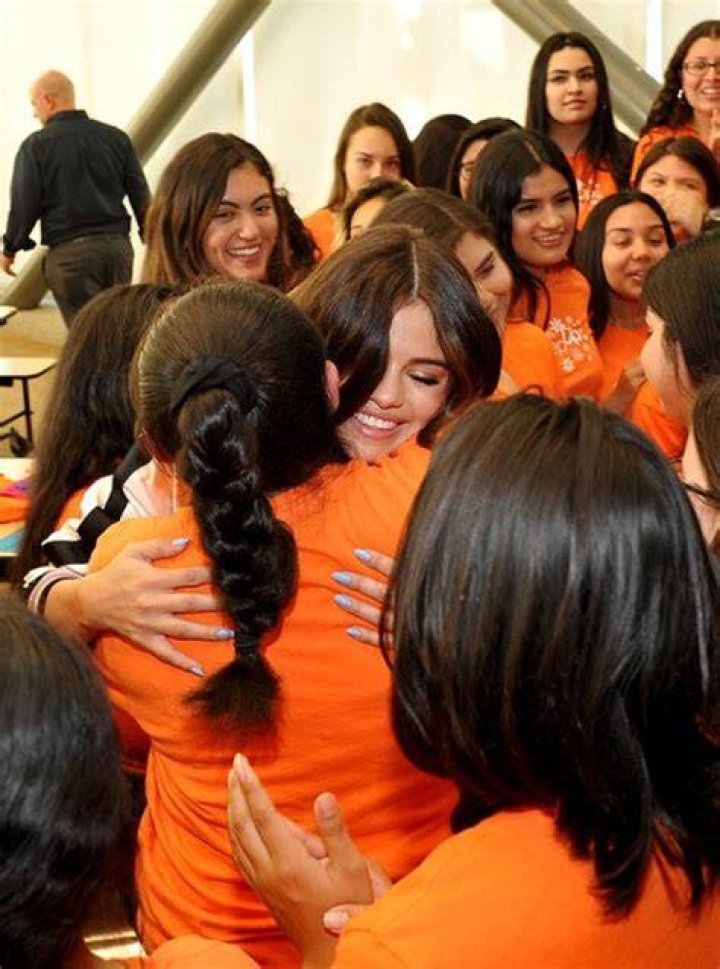 Selena-Gomez-&-Coach-Surprise-Students_1