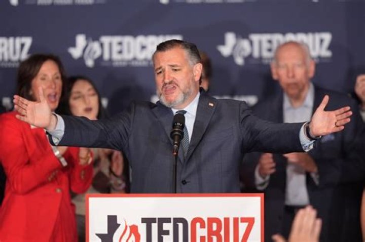Sen. Ted Cruz, R-Texas, walks out of a meeting room for the lawyers of former President Donald Trump and back to the Senate floor through the Senate Reception room on the fourth day of the Senate Impeachment trials for former President Donald Trump on Capitol Hill, Friday, Feb 12, 2021 in Washington. (Jabin Botsford/The Washington Post via AP, Pool)