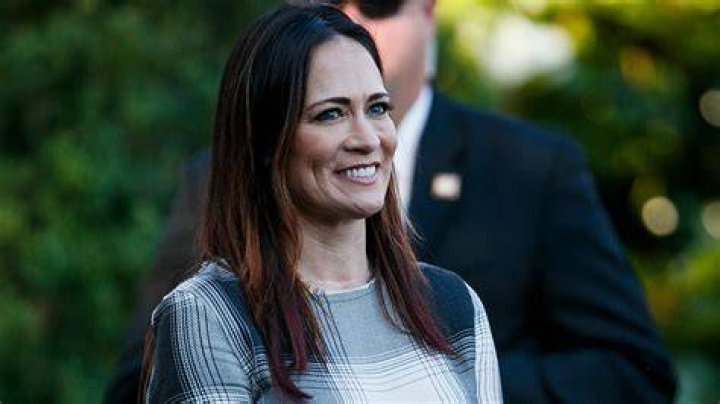 Stephanie Grisham, spokeswoman for first lady Melania Trump, watches as President Donald Trump and the first lady greet attendees during the annual Congressional Picnic on the South Lawn, in Washington Trump, Washington, USA - 21 Jun 2019