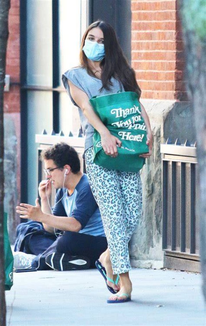Suri Cruise looks over her shoulder