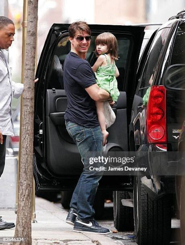 Suri Cruise on a walk with a friend in NYC