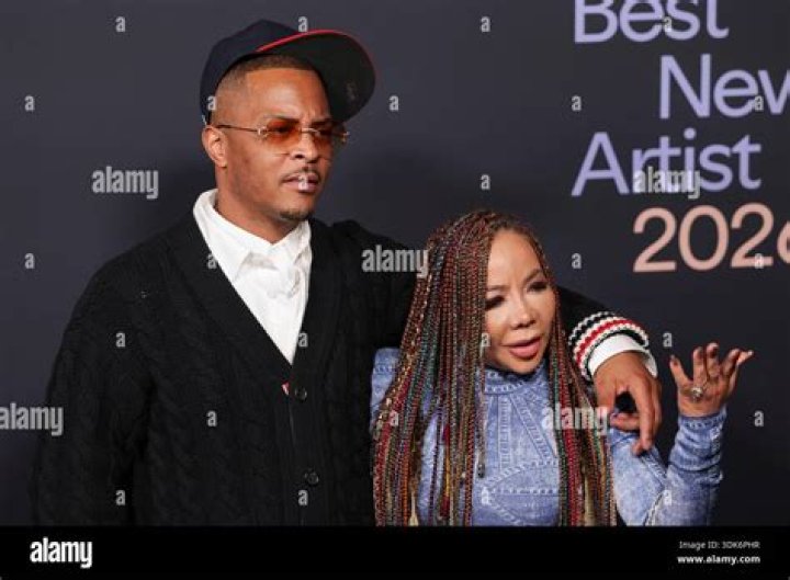 Tameka Harris, left, T.I., and their daughter Heiress Diana Harris arrive at the NAACP 51st Image Awards at the Pasadena Civic Auditorium on Saturday, February 22, 2020 in Pasadena, CA. (Earl Gibson III via AP)