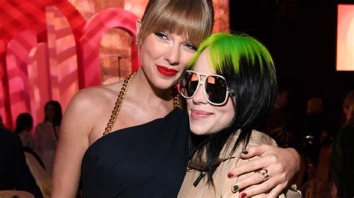 Taylor Swift and Billie Eilish are seen with FIJI Water and JNSQ at Billboard's Women In Music