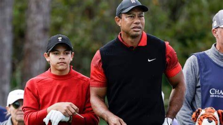 Tiger Woods, right with his daughter Sam Alexis Woods, left, and his girlfriend Erica Herman, center, walk along the Colonnade following a ceremony where President Donald Trump awarded the Presidential Medal of Freedom to Tiger Woods at the White House in Washington, Monday, May 6, 2019. (AP Photo/Manuel Balce Ceneta)