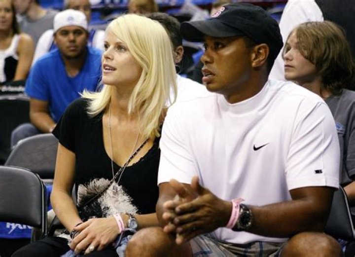 Tiger Woods sits with his family from left; his mother Kultida Woods, son Charlie Woods, daughter Sam Woods and his girlfriend Erica Herman during his induction into the World Golf Hall of Fame, in Ponte Vedra Beach, Fla Hall of Fame Golf, Ponte Vedra Beach, United States - 09 Mar 2022