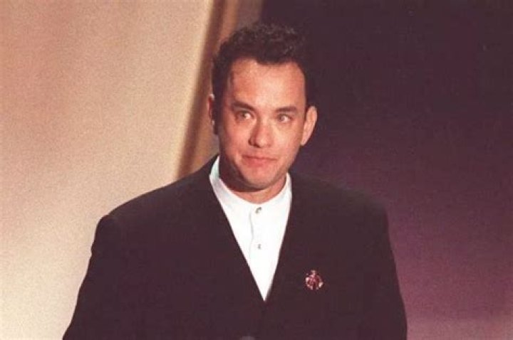 Tom Hanks holds his first Oscar backstage at the 66th Academy Awards ceremony held at the Dorothy Chandler Pavilion in Los Angeles, March 21, 1994. Tom Hanks won the Best Actor Oscar for his role as Andrew Beckett in the movie Philadelphia. (AP Photo/NewsBase)