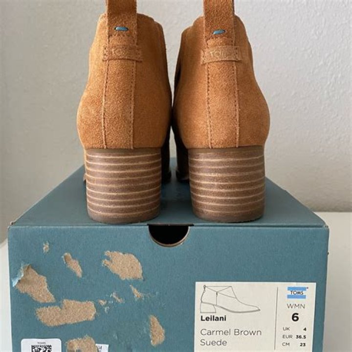 TOMS Carmel Brown Suede and Faux Fur Women&rsquo;s Nova Leather Wrap Slip Ons, $64.99, toms.com