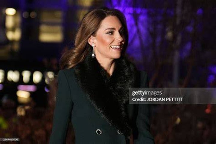 TOPSHOT - Britain's King Charles III and Britain's Queen Camilla wave as they leave by car from Clarence House in London on February 6, 2024. King Charles III's estranged son Prince Harry reportedly arrived in London on Tuesday after his father's diagnosis of cancer, which doctors "caught early". (Photo by HENRY NICHOLLS / AFP) (Photo by HENRY NICHOLLS/AFP via Getty Images)