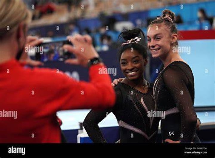 United States Artistic Gymnasts Simone Biles, center, poses for a group photo after their practice session at Ariake Gymnastics Centre before the start of the Tokyo Olympic Games in Tokyo, Japan, on Thursday July 22, 2021. Standing from left to right are: Mykayla Skinner, Sunisa Lee, Simone Biles, Jordan Chiles, Grace McCallum and Jade Carey. Tokyo Olympics, Japan - 22 Jul 2021