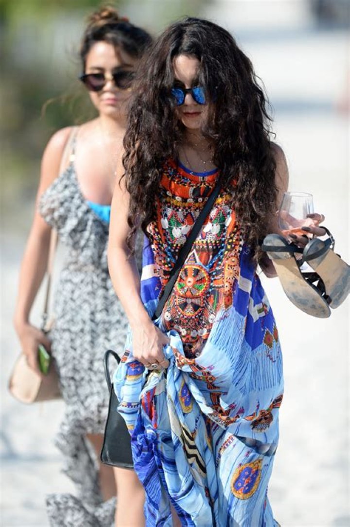 Vanessa Hudgens in Miami Beach on vacation takes a phone call wearing a tiny bathing suit looking very fit. Pictured: Ref: SPL1260167 080416 NON-EXCLUSIVEPicture by: SplashNews.comSplash News and PicturesUSA: +1 310-525-5808London: +44 (0)20 8126 1009Berlin: +49 175 3764 Rights