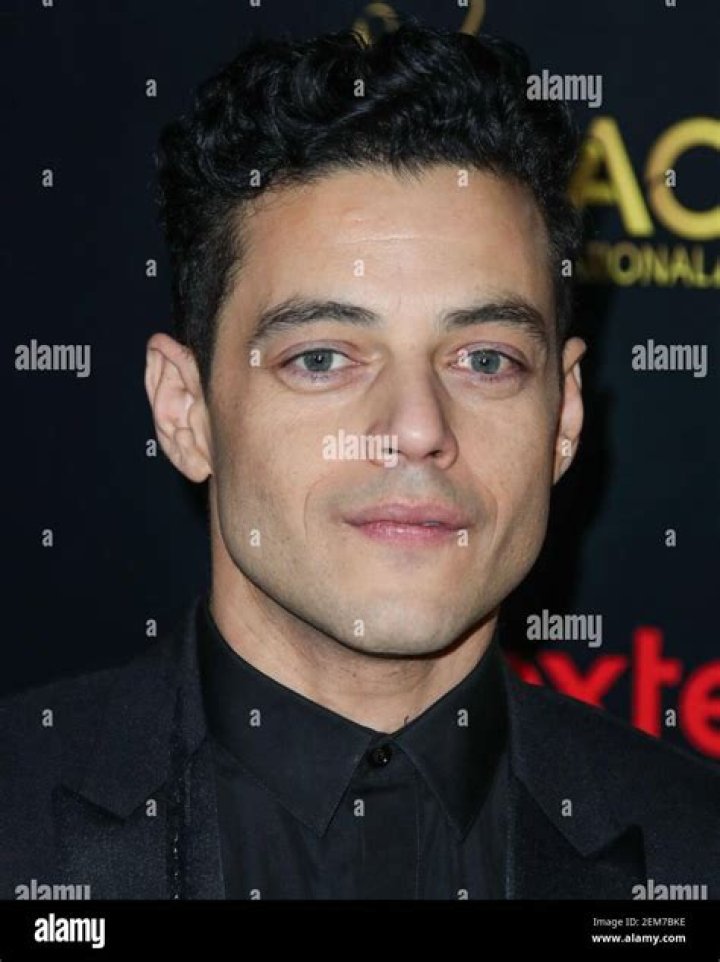 West Hollywood, CA - *EXCLUSIVE* - Rami Malek and his girlfriend Lucy Boynton go shopping at Book Soup Bookstore on Sunset Blvd in West Hollywood. Lucy appears to be feeling under the weather as Rami touches her softly after they return to his Porsche. Pictured: Rami Malek, Lucy Boynton BACKGRID USA 23 AUGUST 2021 USA: +1 310 798 9111 / UK: +44 208 344 2007 / *UK Clients - Pictures Containing Children Please Pixelate Face Prior To Publication*