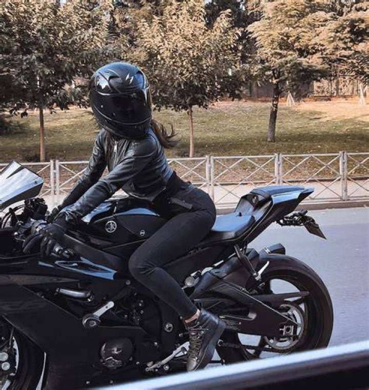 Woman wearing black Sunzel biker shorts with side pockets